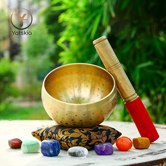 The Ancient Art of Sound Healing: Using Singing Bowls and Chakra Stones